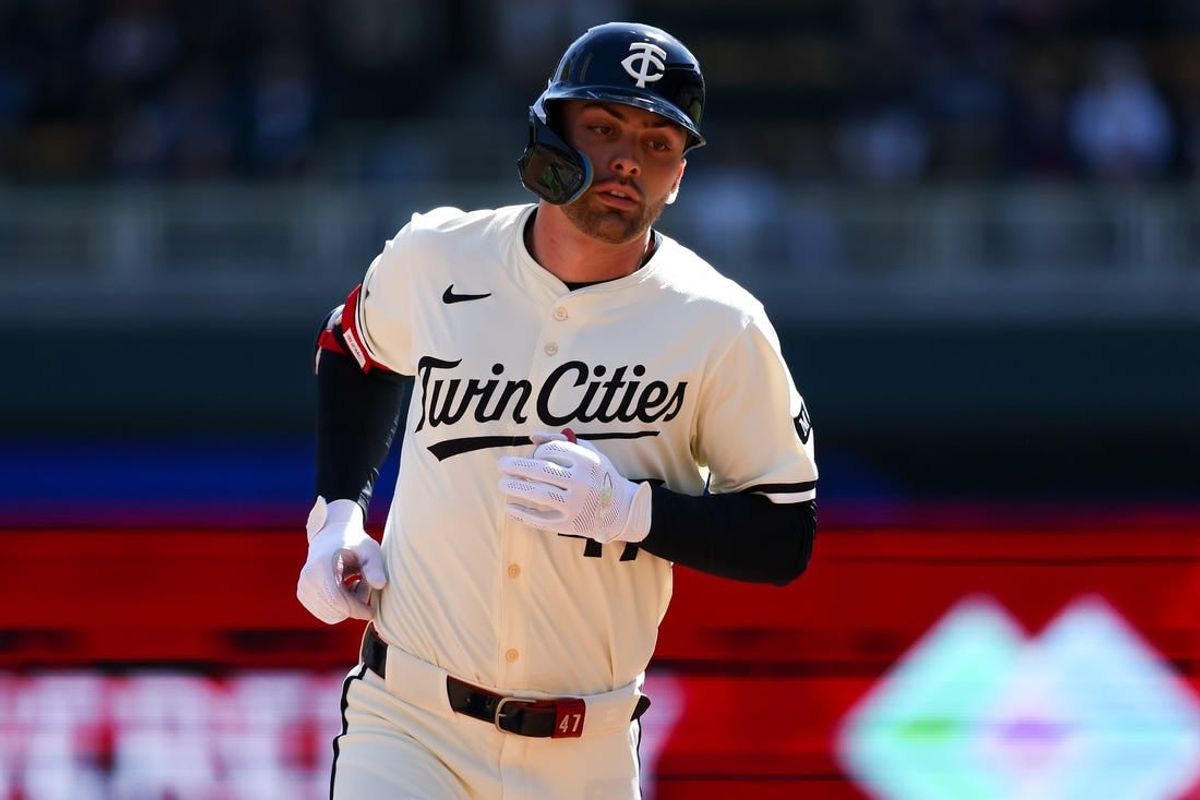 Apr 10, 2024; Minneapolis, Minnesota, USA; Minnesota Twins Edouard Julien (47) runs the bases after hitting a solo home run against the Los Angeles Dodgers during the first inning at Target Field.