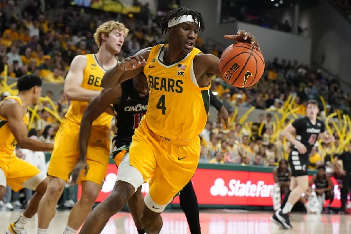 Jan 13, 2024; Waco, Texas, USA; Baylor Bears guard Ja'Kobe Walter (4) grabs the rebound against the Cincinnati Bearcats during the first half at Paul and Alejandra Foster Pavilion.