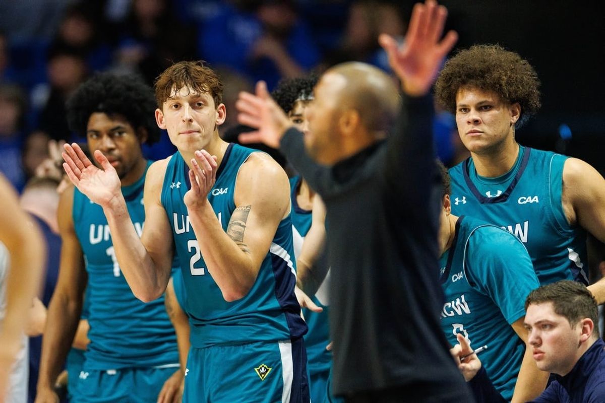Dec 2, 2023; Lexington, Kentucky, USA; North Carolina-Wilmington Seahawks forward Eric Van Der Heijden (23) celebrates from the bench during the second half against the Kentucky Wildcats at Rupp Arena at Central Bank Center.