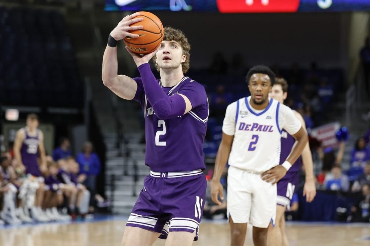 Dec 16, 2023; Chicago, Illinois, USA; Northwestern Wildcats forward Nick Martinelli (2) shoots a free throw against the DePaul Blue Demons during the first half at Wintrust Arena.