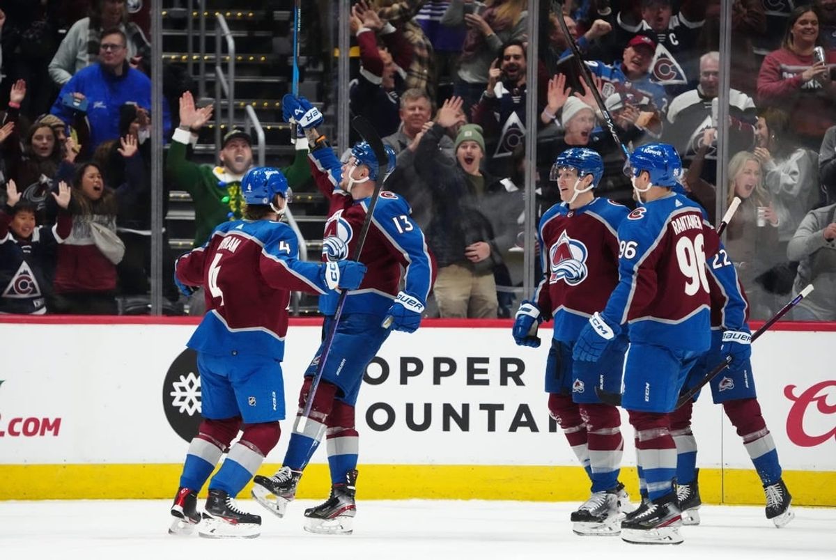 Dec 13, 2023; Denver, Colorado, USA; Colorado Avalanche right wing Valeri Nichushkin (13) (center) celebrates his goal in the first period against the Buffalo Sabres at Ball Arena.