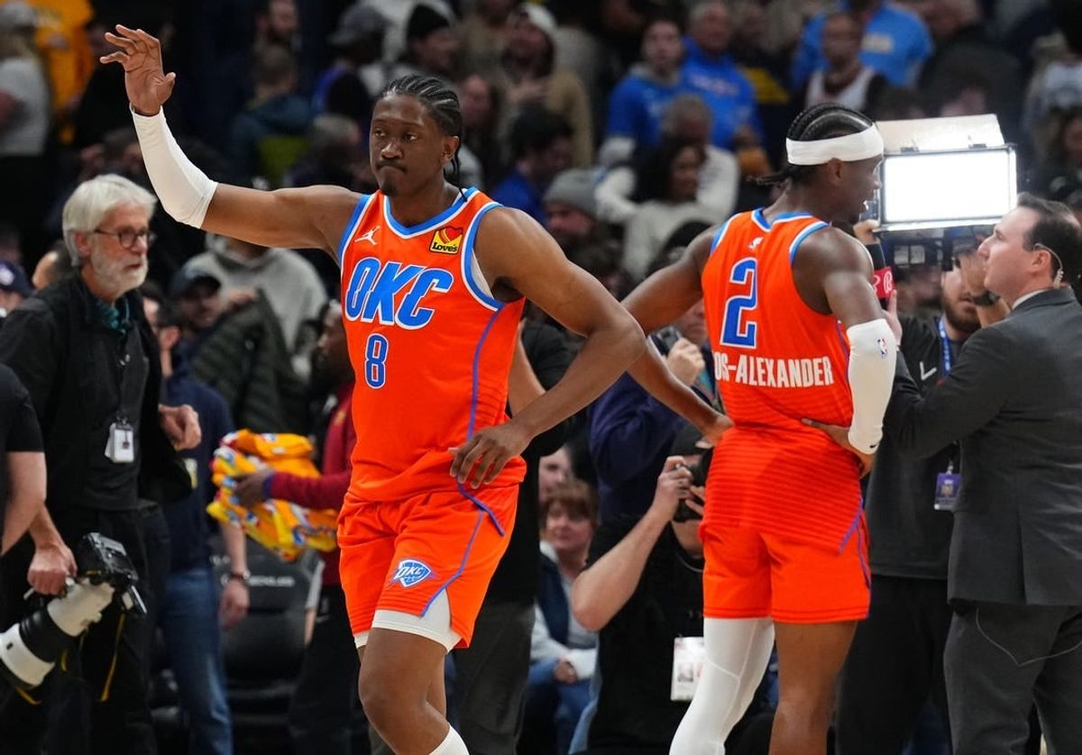 Dec 16, 2023; Denver, Colorado, USA; Oklahoma City Thunder forward Jalen Williams (8) and guard Shai Gilgeous-Alexander (2) celebrate after defeating the Denver Nuggets at Ball Arena.