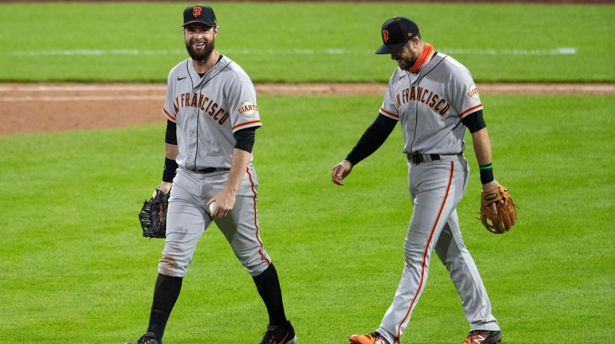 Brandon Belt and Evan Longoria are leading the Giants to glory ... so far.
