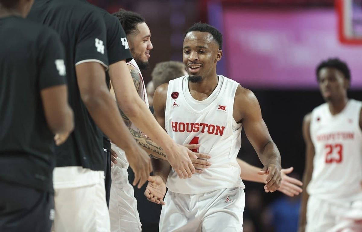 Dec 9, 2023; Houston, Texas, USA; Houston Cougars guard LJ Cryer (4) after a play during the first half against the Jackson State Tigers at Fertitta Center.