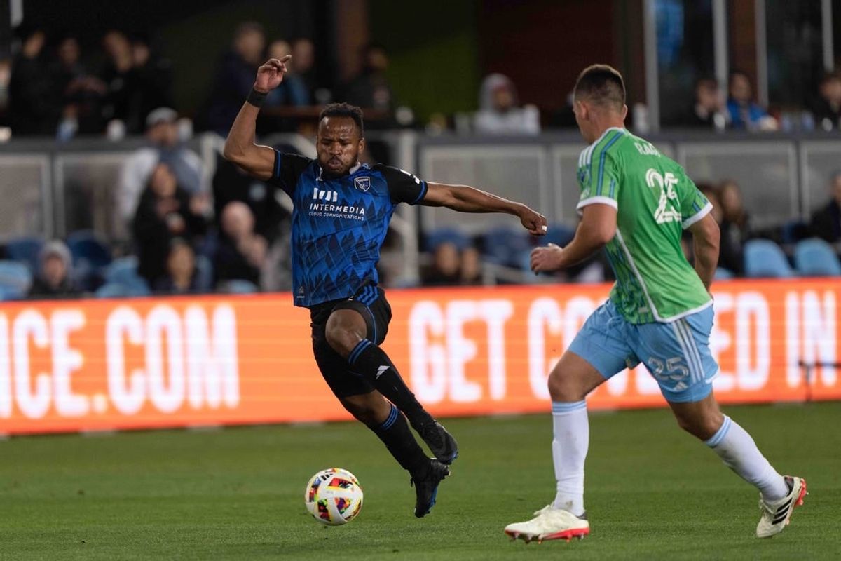 Mar 24, 2024; San Jose, California, USA; San Jose Earthquakes forward Jeremy Ebobisse (11) dribbles against Seattle Sounders FC defender Jackson Ragen (25) during the second half at PayPal Park.