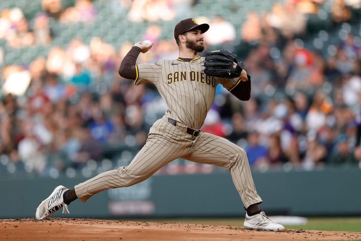 Apr 22, 2024; Denver, Colorado, USA; San Diego Padres starting pitcher Dylan Cease (84) pitches in the first inning against the Colorado Rockies at Coors Field.