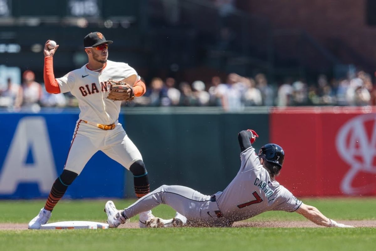Apr 21, 2024; San Francisco, California, USA;  San Francisco Giants second baseman Thairo Estrada (39) tags Arizona Diamondbacks center fielder Corbin Carroll (7) in the first part of a double play during the first inning at Oracle Park.