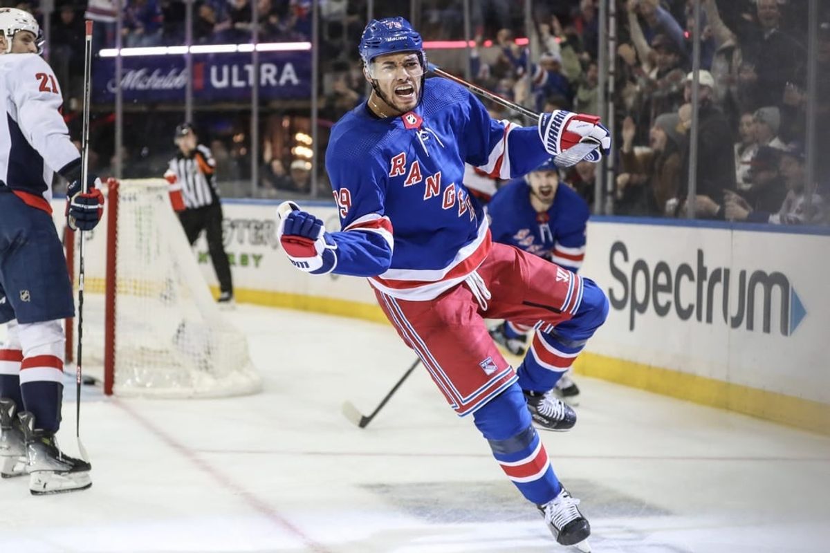 Dec 27, 2023; New York, New York, USA; New York Rangers defenseman K'Andre Miller (79) celebrates after scoring a goal in the second period against the Washington Capitals at Madison Square Garden.
