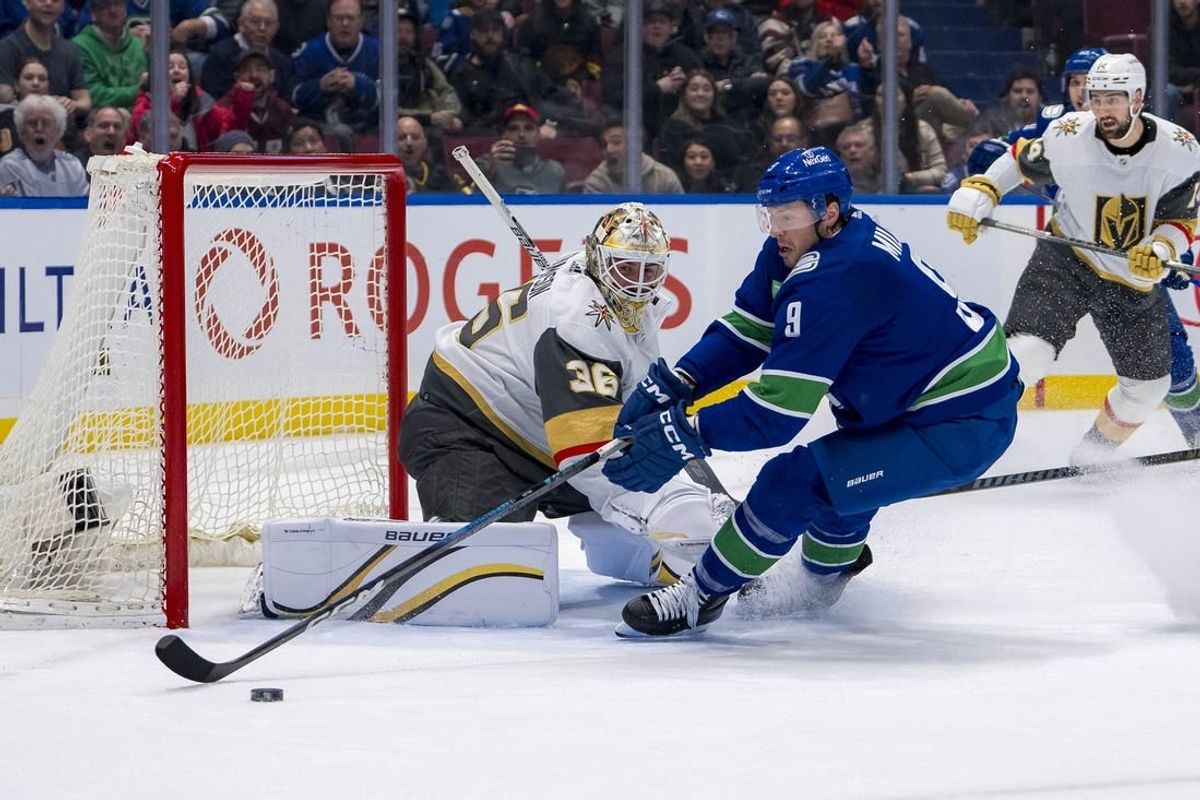 Apr 8, 2024; Vancouver, British Columbia, CAN; Vegas Golden Knights goalie Logan Thompson (36) watches Vancouver Canucks forward J.T. Miller (9) handle the puck in the first period  at Rogers Arena.