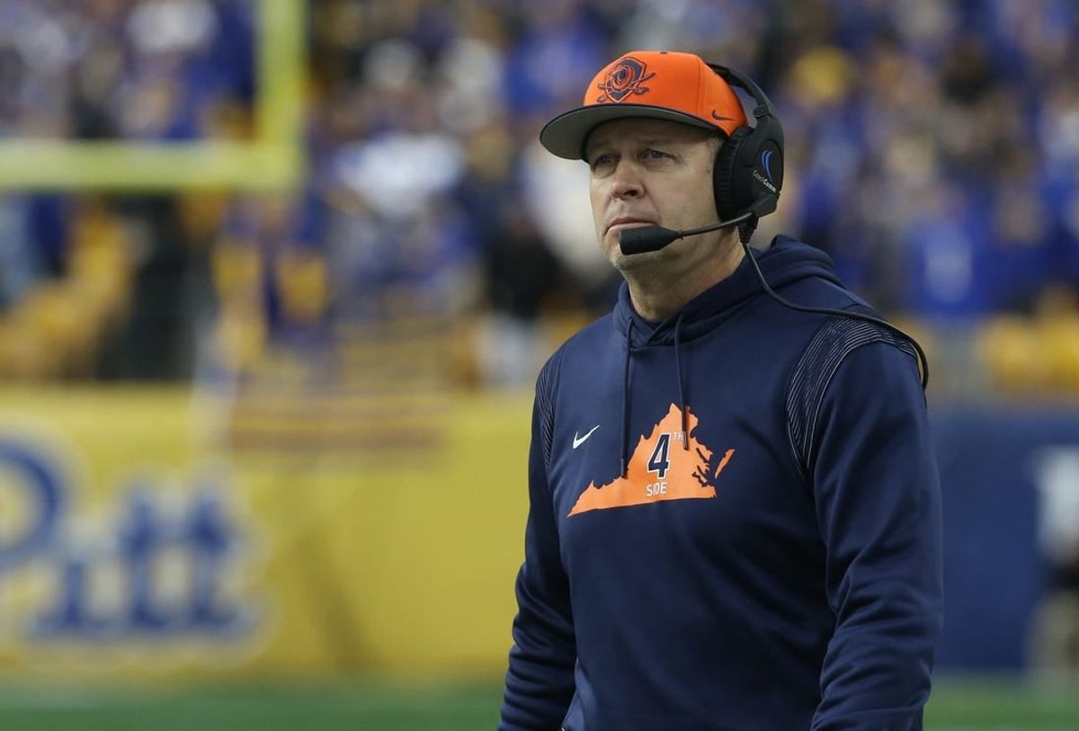 Nov 20, 2021; Pittsburgh, Pennsylvania, USA;  Virginia Cavaliers head coach Bronco Mendenhall looks on from the sidelines against the Pittsburgh Panthers during the second quarter at Heinz Field.
