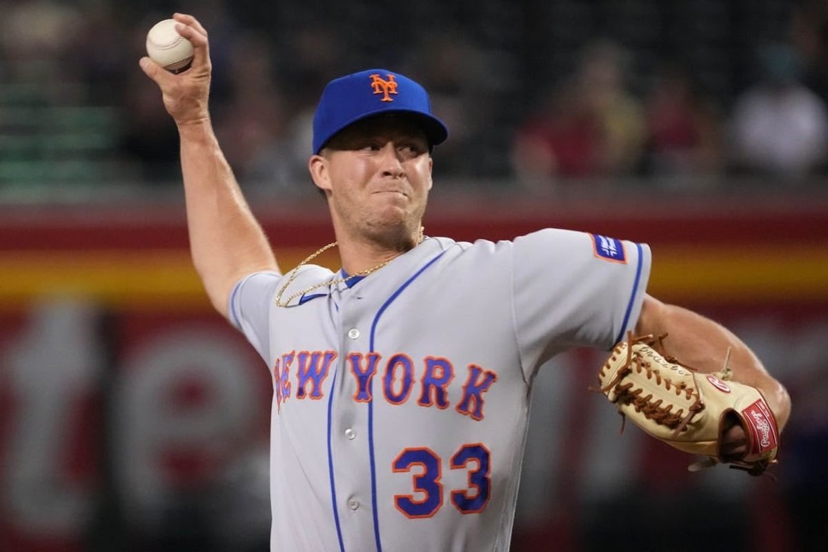 Jul 6, 2023; Phoenix, Arizona, USA; New York Mets relief pitcher Trevor Gott (33) pitches against the Arizona Diamondbacks during the ninth inning at Chase Field.