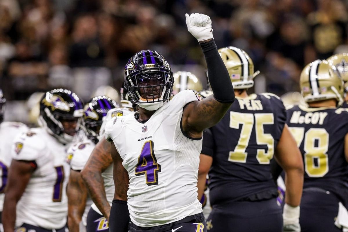 Nov 7, 2022; New Orleans, Louisiana, USA;  Baltimore Ravens linebacker Jason Pierre-Paul (4) signals a 4th down stop against the New Orleans Saints during the first half at Caesars Superdome.