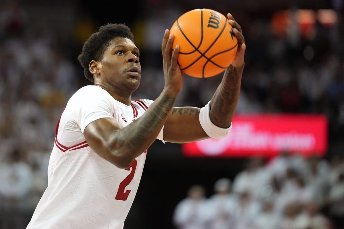 Dec 2, 2023; Madison, Wisconsin, USA;  Wisconsin Badgers guard AJ Storr (2) shoots a free throw against the Marquette Golden Eagles during the second half at the Kohl Center.