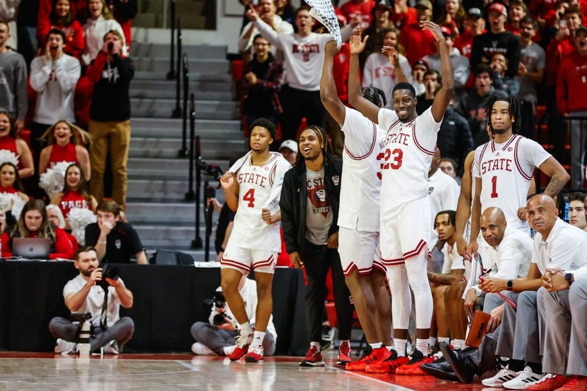 Dec 6, 2023; Raleigh, North Carolina, USA; North Carolina State Wolfpack bench reacts during the second half against Maryland-Eastern Shore Hawks at James T. Valvano Arena at William Neal Reynolds.
