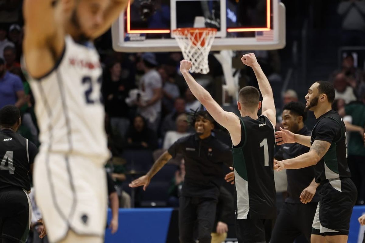 Mar 19, 2024; Dayton, OH, USA; Wagner Seahawks guard Javier Ezquerra (1) celebrates defeating the Howard Bison  at UD Arena.