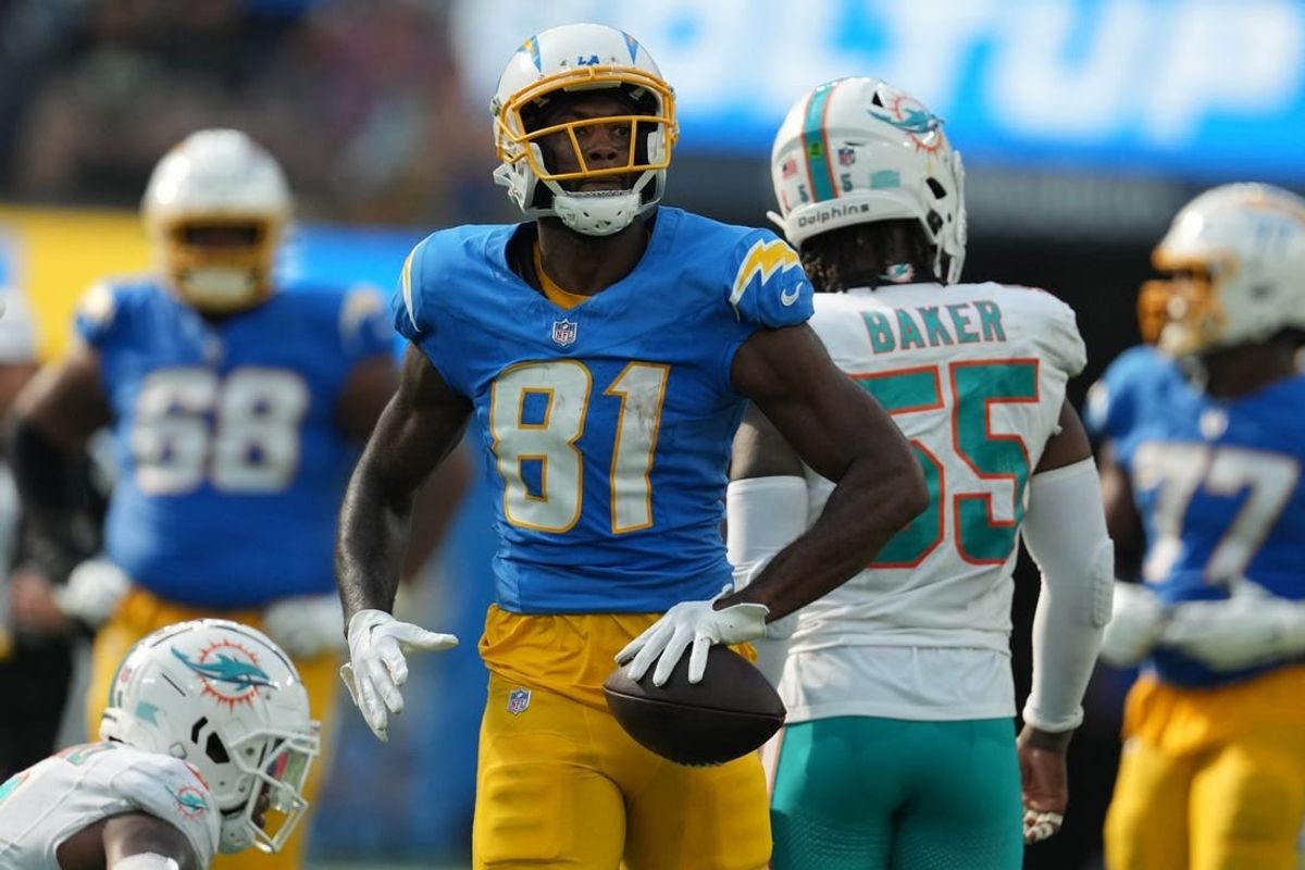 Sep 10, 2023; Inglewood, California, USA; Los Angeles Chargers wide receiver Mike Williams (81) reacts after a first down against the Miami Dolphins in the second half at SoFi Stadium.