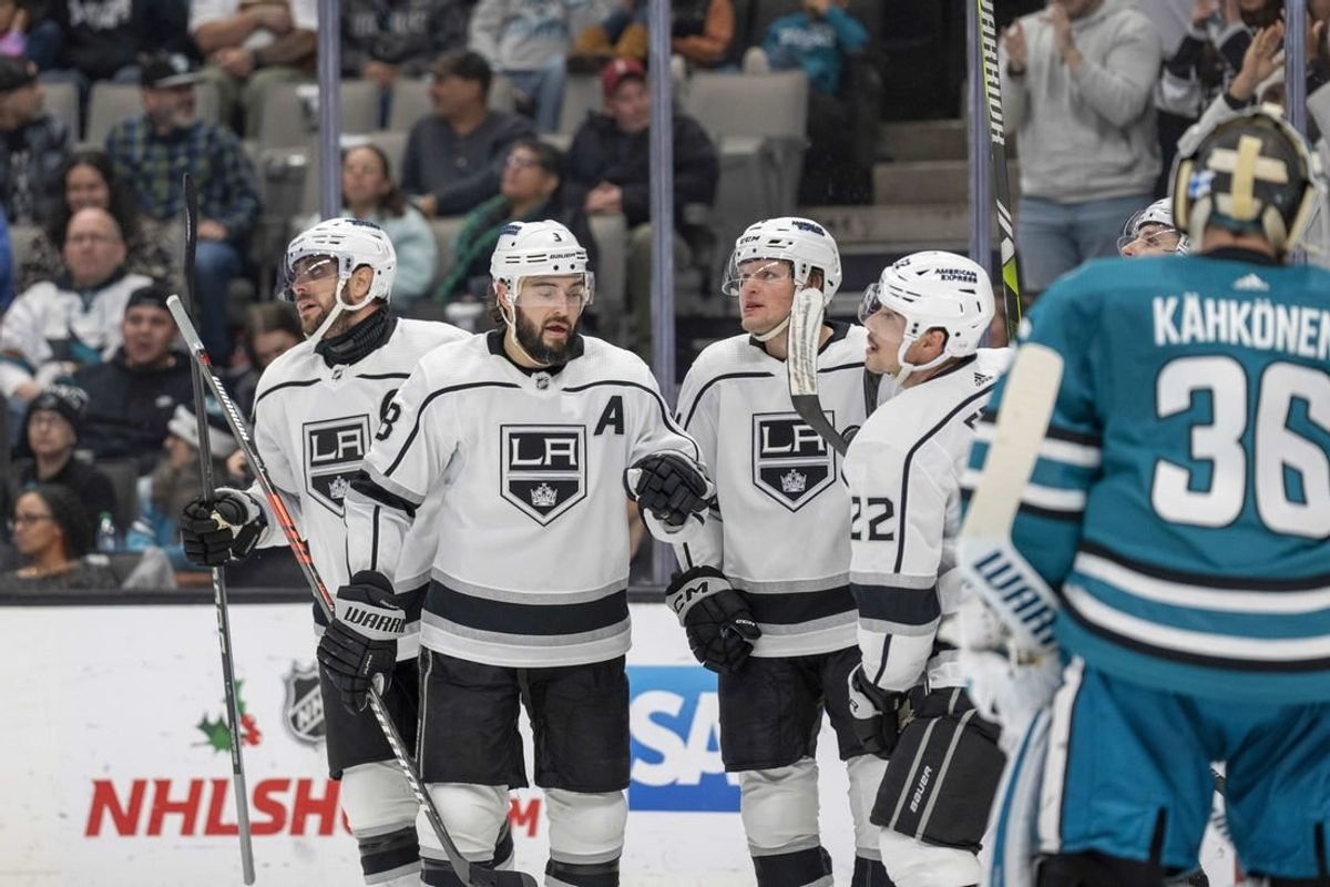 Dec 19, 2023; San Jose, California, USA; Los Angeles Kings celebrate after the goal during the first period against the San Jose Sharks at SAP Center at San Jose.