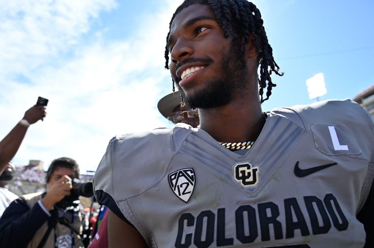 Sep 30, 2023; Boulder, Colorado, USA;  Colorado Buffaloes quarterback Shedeur Sanders (2) smiles as he walks off the field after the game against the USC Trojans at Folsom Field.