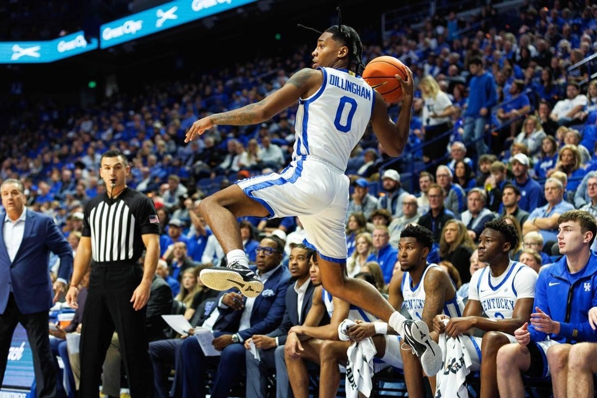 Nov 17, 2023; Lexington, Kentucky, USA; Kentucky Wildcats guard Rob Dillingham (0) saves a ball from going out of bounds during the first half against the Stonehill Skyhawks at Rupp Arena at Central Bank Center.
