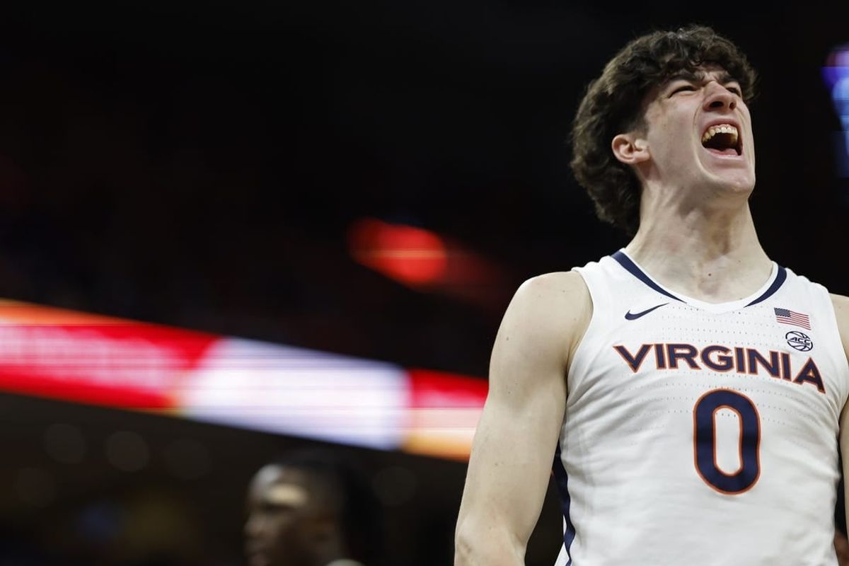 Feb 17, 2024; Charlottesville, Virginia, USA; Virginia Cavaliers forward Blake Buchanan (0) reacts after scoring while being fouled against the Wake Forest Demon Deacons in the second half at John Paul Jones Arena.