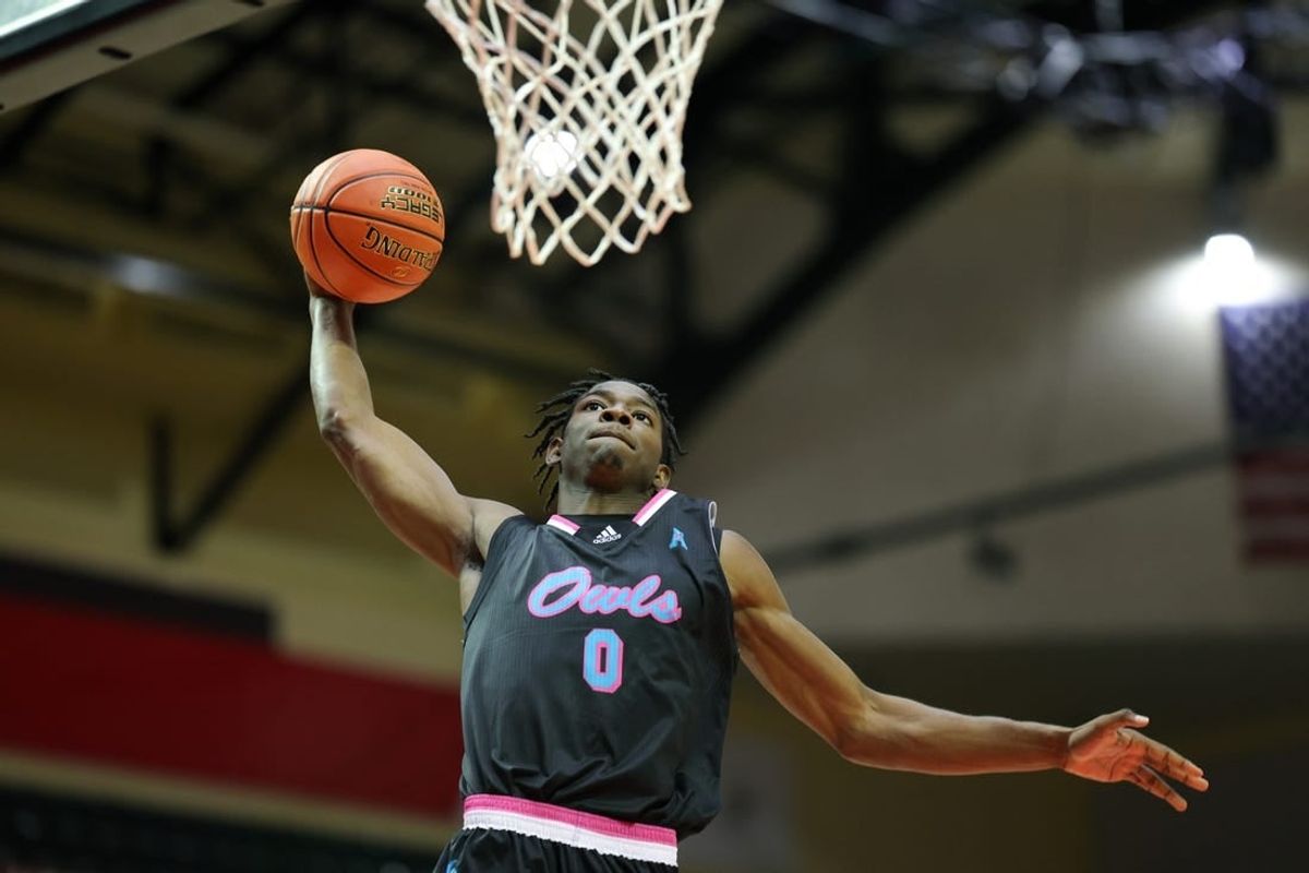 Nov 26, 2023; Kissimmee, FL, USA;  Florida Atlantic Owls forward Brenen Lorient (0) dunks the ball against the Virginia Tech Hokies in the second half during the ESPN Events Invitational Championship game at State Farm Field House.