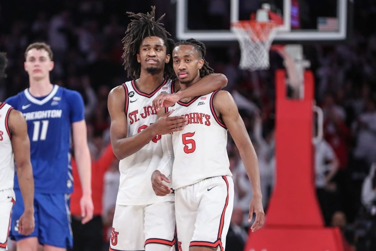 Feb 25, 2024; New York, New York, USA;  St. John's Red Storm forward Glenn Taylor Jr. (35) hugs guard Daniss Jenkins (5) in the second half against the Creighton Bluejays at Madison Square Garden.