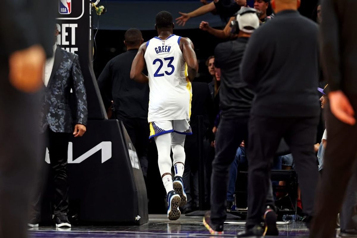Dec 12, 2023; Phoenix, Arizona, USA; Golden State Warriors forward Draymond Green (23) runs to the locker room after being ejected for a flagrant foul two during the third quarter against the Phoenix Suns at Footprint Center.