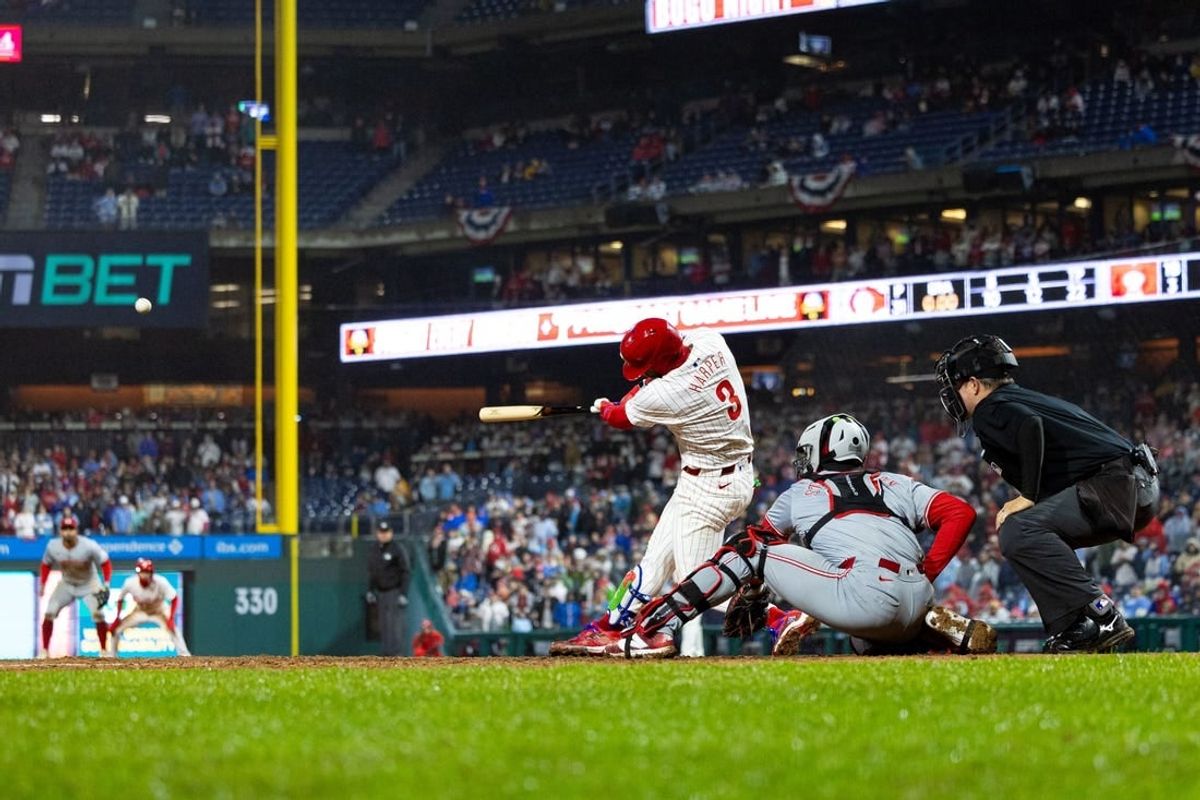 Apr 2, 2024; Philadelphia, Pennsylvania, USA; Philadelphia Phillies first baseman Bryce Harper (3) hits a four RBI grand slam during the seventh inning against the Cincinnati Reds at Citizens Bank Park.
