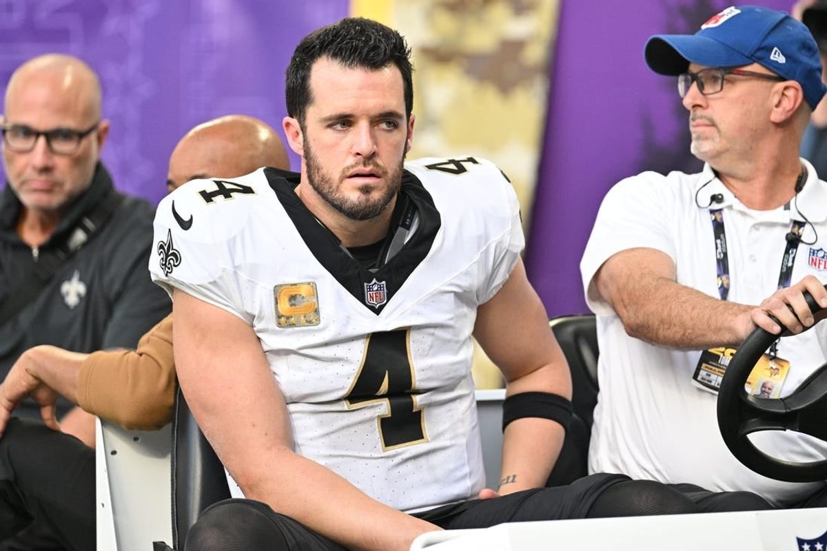 Nov 12, 2023; Minneapolis, Minnesota, USA; New Orleans Saints quarterback Derek Carr (4) is carted off the field after an injury against the Minnesota Vikings during the thrid quarter at U.S. Bank Stadium.