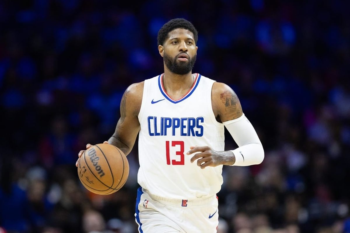 Mar 27, 2024; Philadelphia, Pennsylvania, USA; LA Clippers forward Paul George (13) dribbles the ball against the Philadelphia 76ers during the fourth quarter at Wells Fargo Center.
