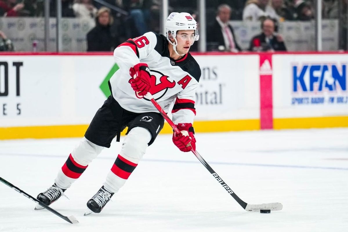 Nov 2, 2023; Saint Paul, Minnesota, USA; New Jersey Devils center Jack Hughes (86) passes during the first period against the Minnesota Wild at Xcel Energy Center.
