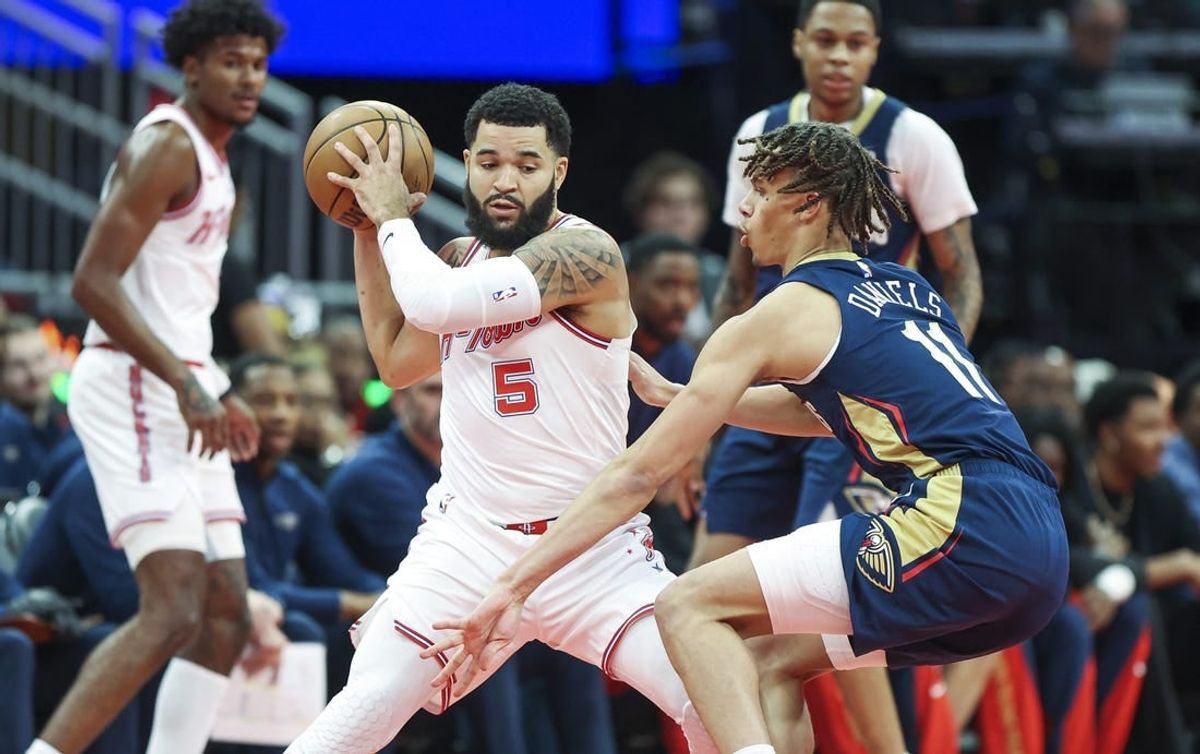 Nov 10, 2023; Houston, Texas, USA; Houston Rockets guard Fred VanVleet (5) controls the ball as New Orleans Pelicans guard Dyson Daniels (11) defends during the first quarter at Toyota Center.