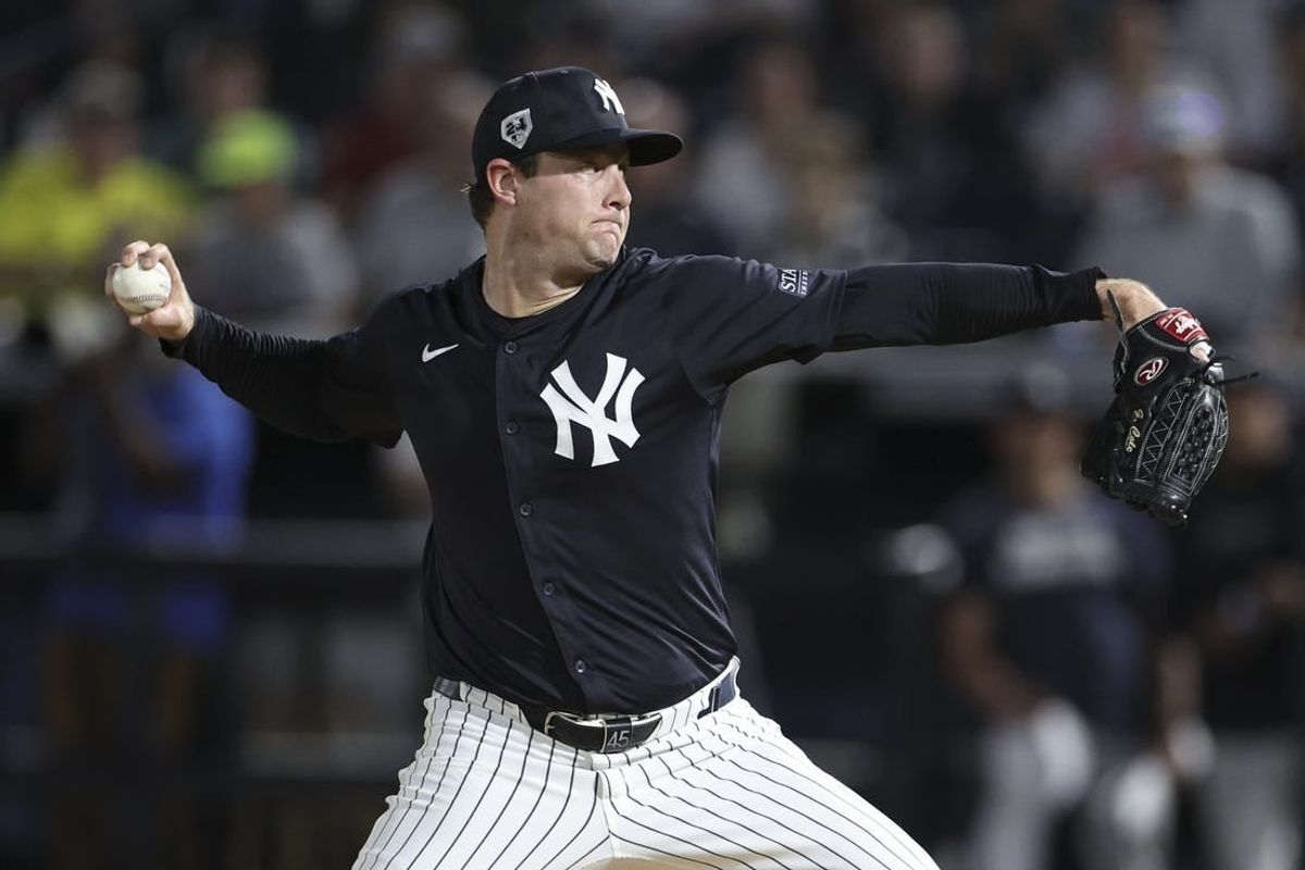Mar 1, 2024; Tampa, Florida, USA;  New York Yankees starting pitcher Gerrit Cole (45) throws a pitch against the Toronto Blue Jays in the first inning at George M. Steinbrenner Field.