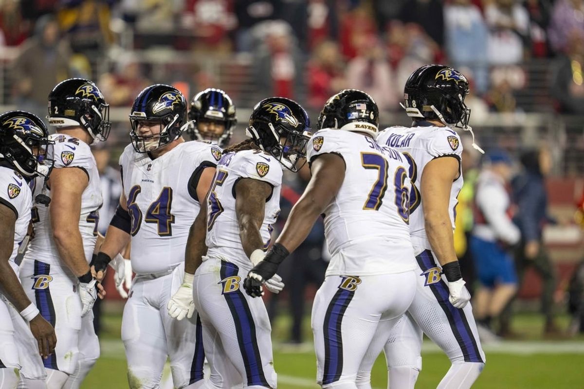 Dec 25, 2023; Santa Clara, California, USA; Baltimore Ravens running back Gus Edwards (35) celebrates with guard John Simpson (76) and teammates after the touchdown during the second quarter against the San Francisco 49ers at Levi's Stadium.