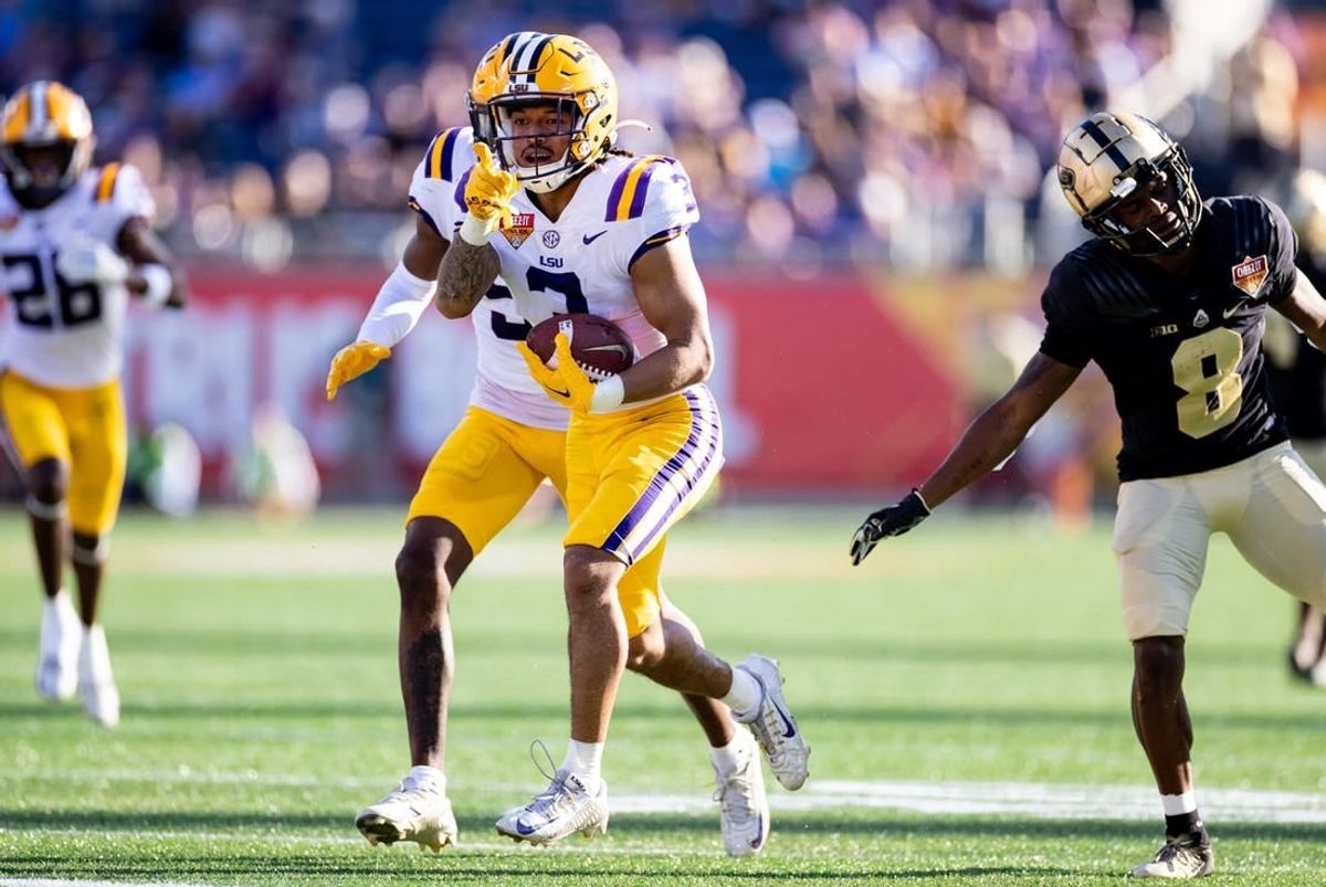 Jan 2, 2023; Orlando, FL, USA; LSU Tigers safety Greg Brooks Jr. (3) gestures after an interception during the second half against the Purdue Boilermakers at Camping World Stadium.