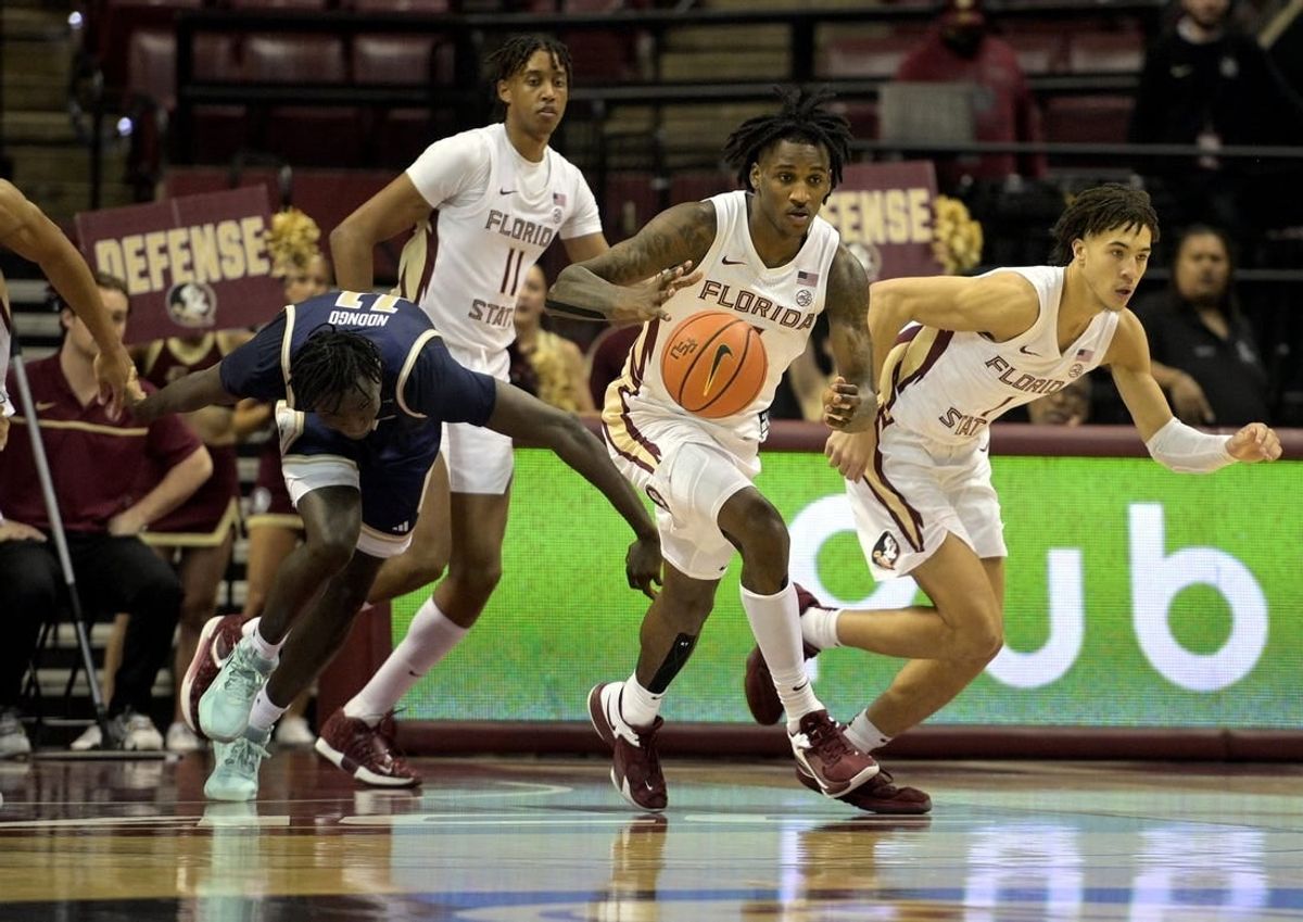 Jan 3, 2024; Tallahassee, Florida, USA; Florida State Seminoles forward Jamir Watkins (2) moves the ball up the court after a defensive stand against the Georgia Tech Yellow Jackets at Donald L. Tucker Center.