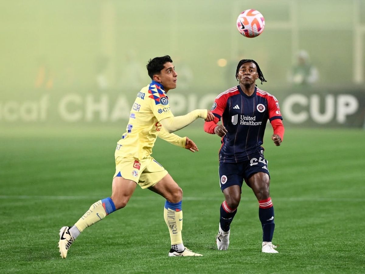Apr 2, 2024; Foxborough, MA, USA; Club America defender Kevin Alvarez (5) and New England Revolution forward DeJuan Jones (24) head the ball during the second half at Gillette Stadium.