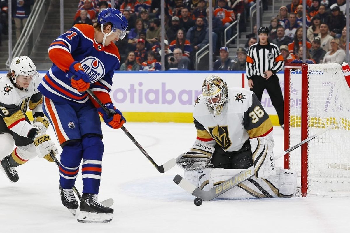 Nov 28, 2023; Edmonton, Alberta, CAN; Vegas Golden Knights goaltender Logan Thompson (36) makes a save on a shot by Edmonton Oilers forward Ryan McLeod (71) during the first period at Rogers Place.