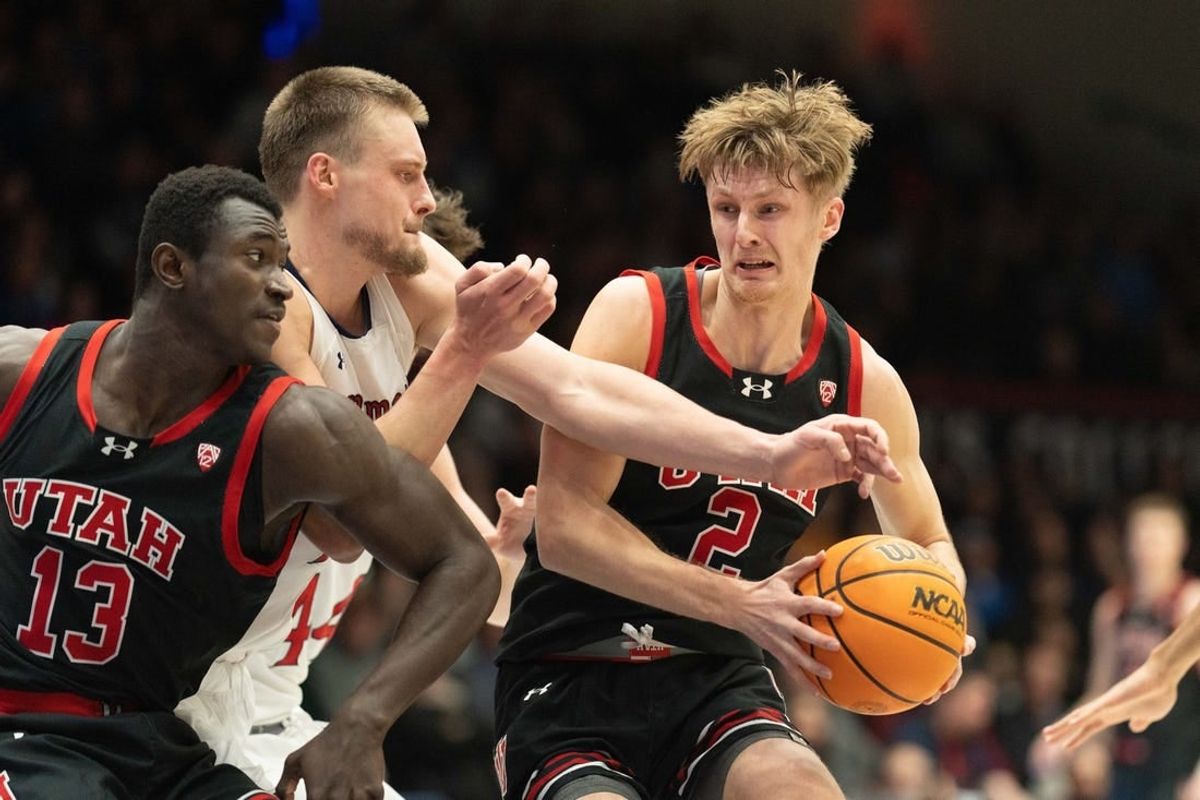 Nov 27, 2023; Moraga, California, USA;  Utah Utes guard Cole Bajema (2) controls the ball during the first half against St. Mary's Gaels center Mitchell Saxen (11) at University Credit Union Pavilion.