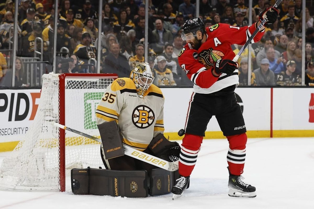Oct 11, 2023; Boston, Massachusetts, USA; Boston Bruins goaltender Linus Ullmark (35) makes a save as Chicago Blackhawks left wing Nick Foligno (17) looks for the rebound during the first period at TD Garden.