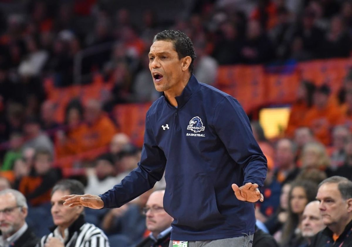 Dec 12, 2022; Syracuse, New York, USA; Monmouth Hawks head coach King Rice calls out to his team in the first half against the Syracuse Orange at JMA Wireless Dome.