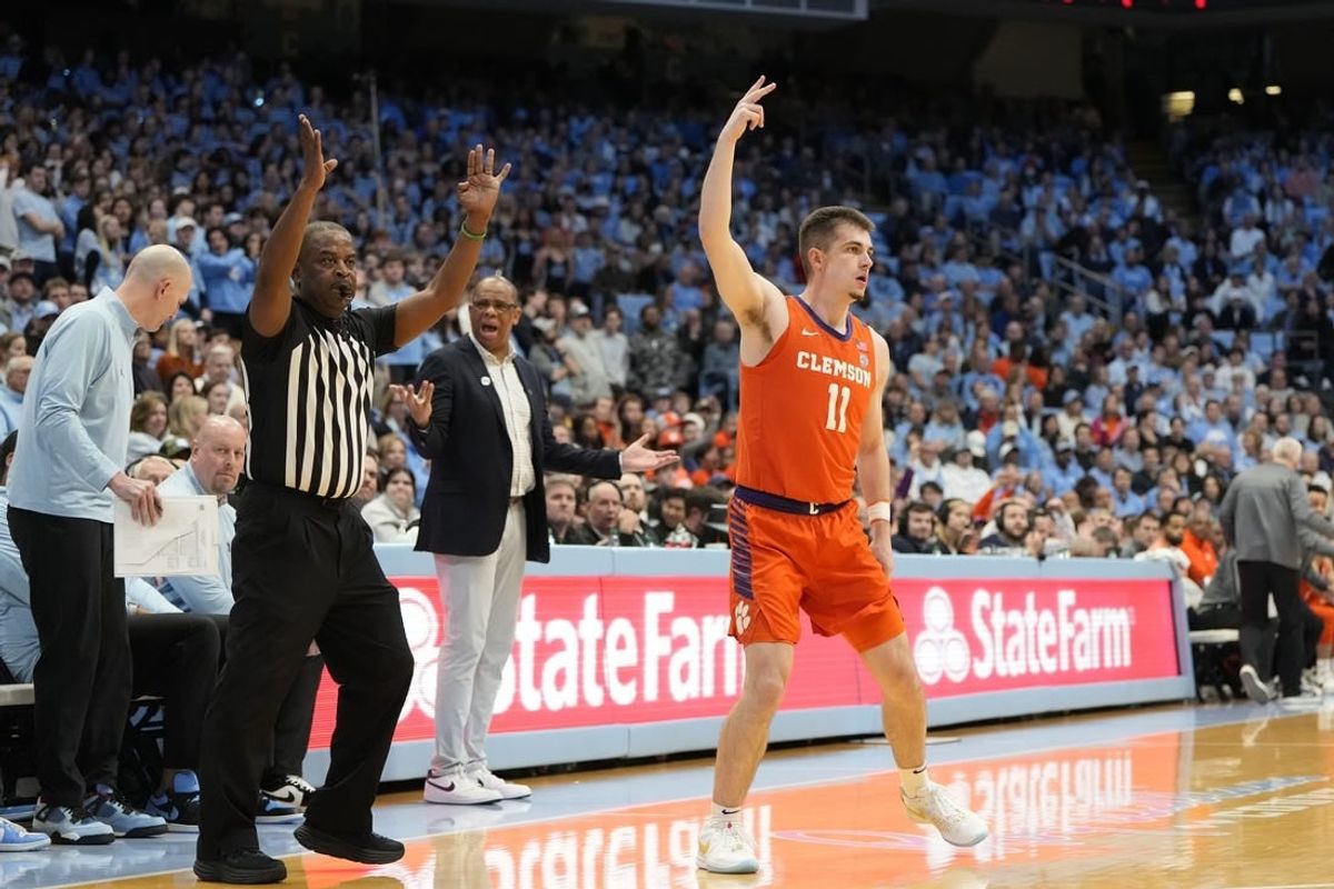 Feb 6, 2024; Chapel Hill, North Carolina, USA;  Clemson Tigers guard Joseph Girard III (11) reacts after hitting a three point shot in the first half at Dean E. Smith Center.