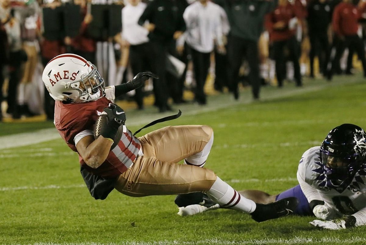 Iowa State Cyclones' running back Eli Sanders (6) breaks a tackle from TCU Horned Frogs' linebacker Shad Banks jR.(0) and drives for a touchdown during the first half in the Jack Trice Legacy Game at Jack Trice Stadium on Saturday, Oct. 7, 2023, in Ames, Iowa.