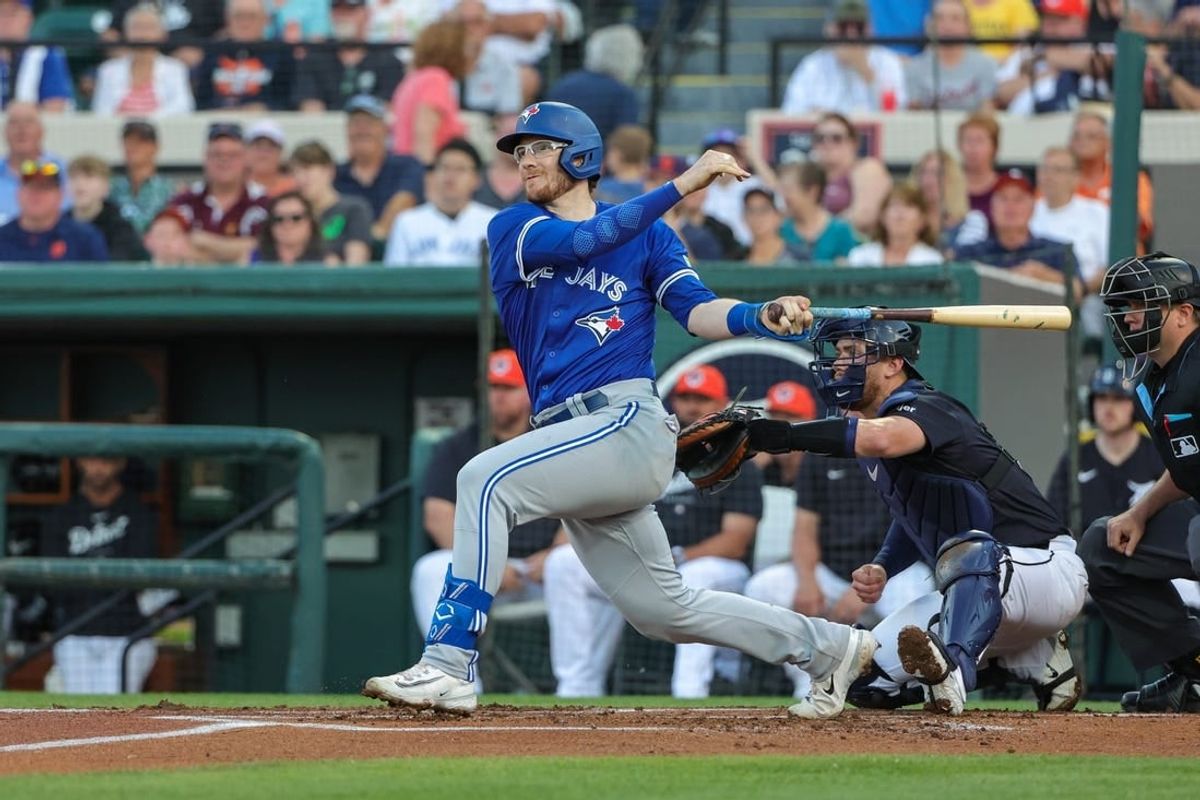 Mar 7, 2024; Lakeland, Florida, USA; Toronto Blue Jays catcher Danny Jansen (9) bats during the first inning against the Detroit Tigers at Publix Field at Joker Marchant Stadium.