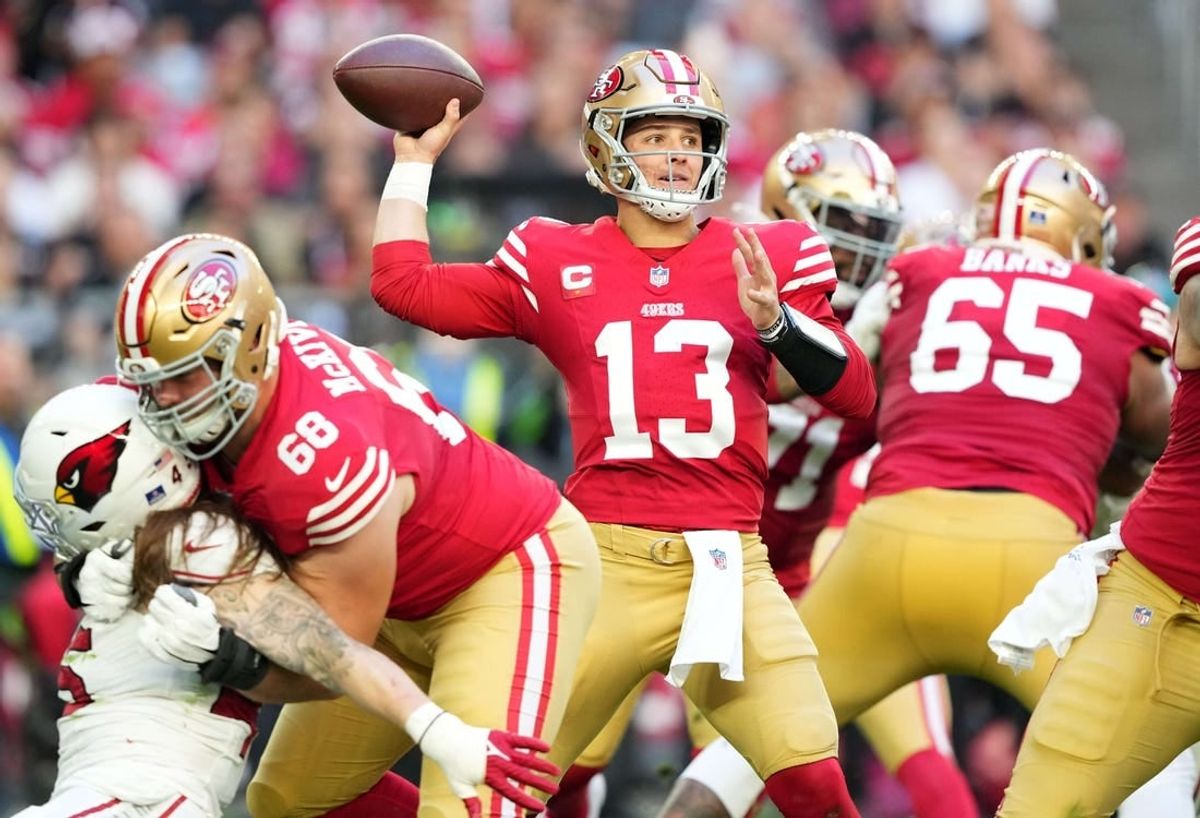 Dec 17, 2023; Glendale, Arizona, USA; San Francisco 49ers quarterback Brock Purdy (13) throws against the Arizona Cardinals during the first half at State Farm Stadium.