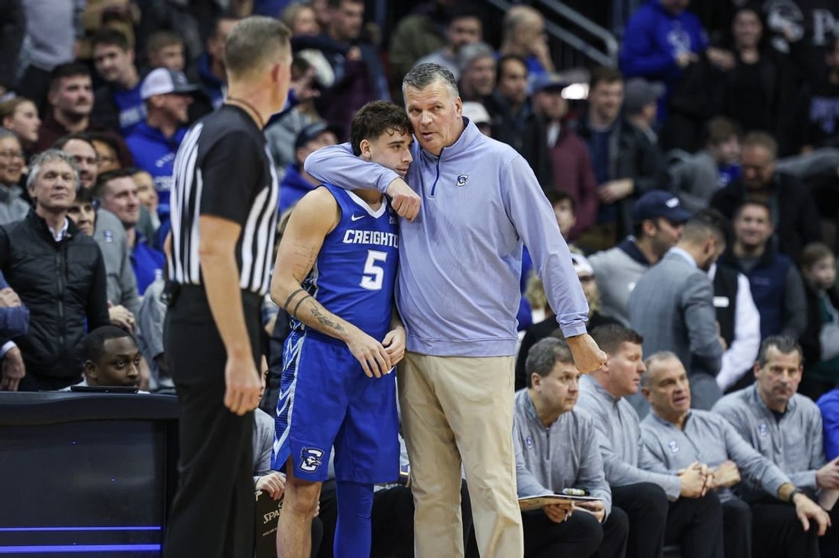 Jan 20, 2024; Newark, New Jersey, USA; Creighton Bluejays head coach Greg McDermott talks with guard Francisco Farabello (5) during triple overtime against the Seton Hall Pirates at Prudential Center.