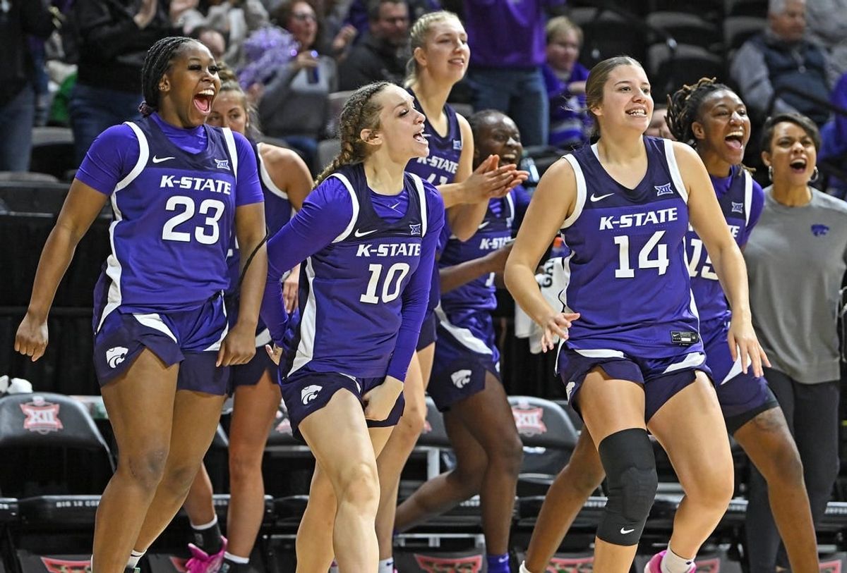 Mar 10, 2023; Kansas City, MO, USA;  Kansas State Wildcats guard Mimi Gatewood (23), Mikayla Parks (10) and Rebekah Dallinger (14) reacts after a Wildcat score during the first half against the Texas Longhorns at Municipal Auditorium.