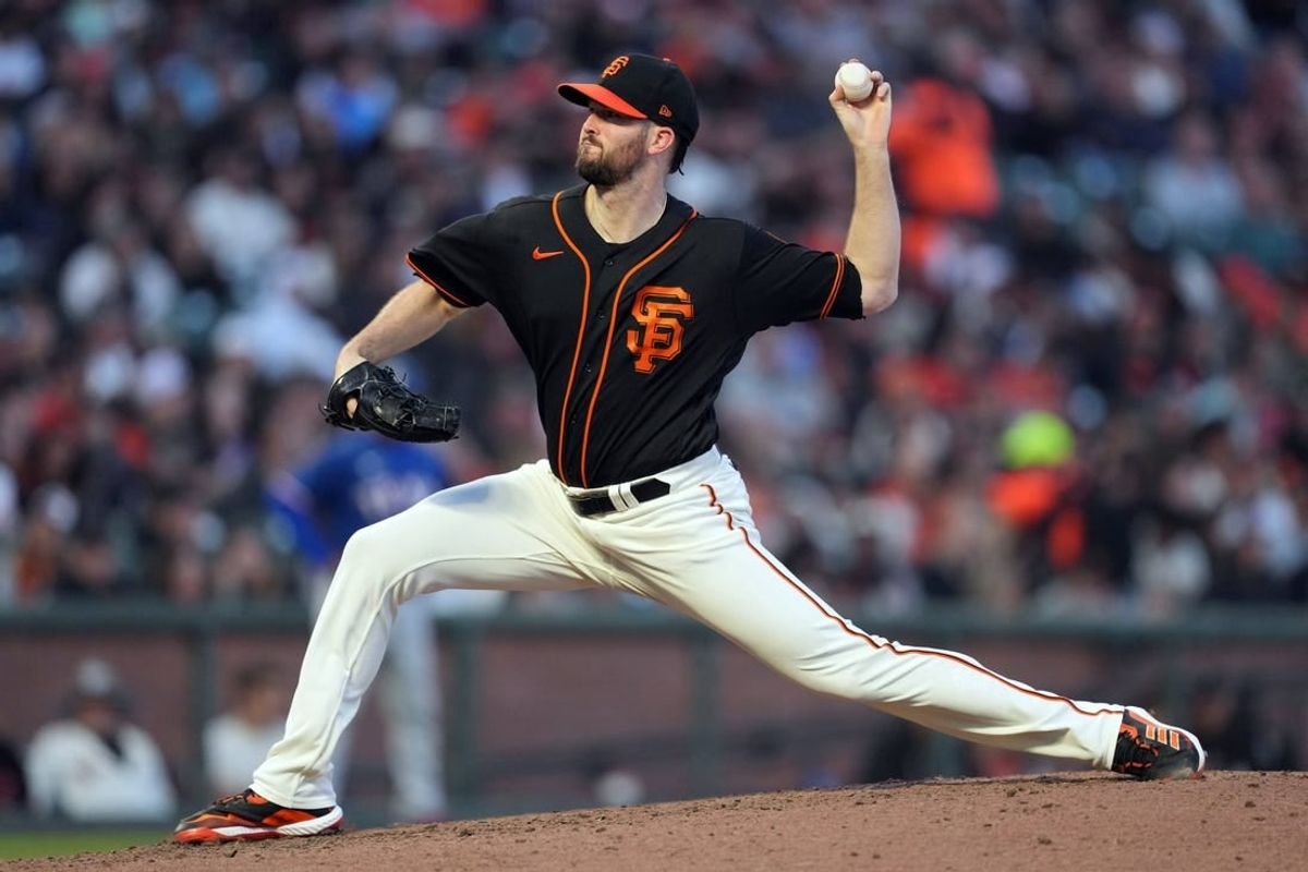 Aug 12, 2023; San Francisco, California, USA; San Francisco Giants starting pitcher Alex Wood (57) throws a pitch against the Texas Rangers during the sixth inning at Oracle Park.