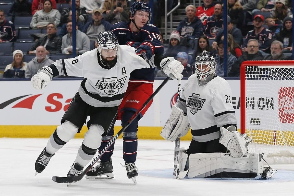 Dec 5, 2023; Columbus, Ohio, USA; Los Angeles Kings defenseman Drew Doughty (8) and Columbus Blue Jackets left wing Dmitri Voronkov (10) battle for position in front of goalie Pheonix Copley (29) during the first period at Nationwide Arena.