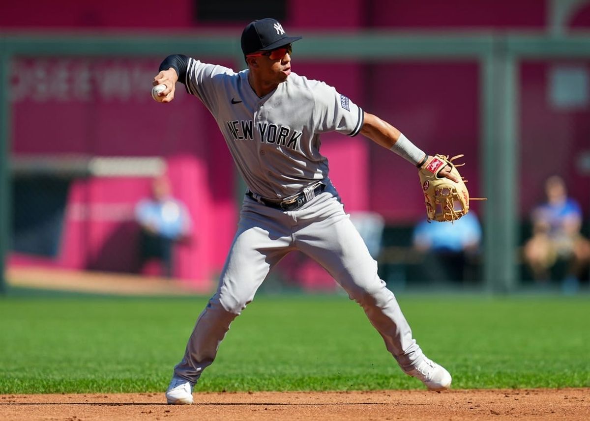 Oct 1, 2023; Kansas City, Missouri, USA; New York Yankees second baseman Oswald Peraza (91) throws to first base during the first inning against the Kansas City Royals at Kauffman Stadium.